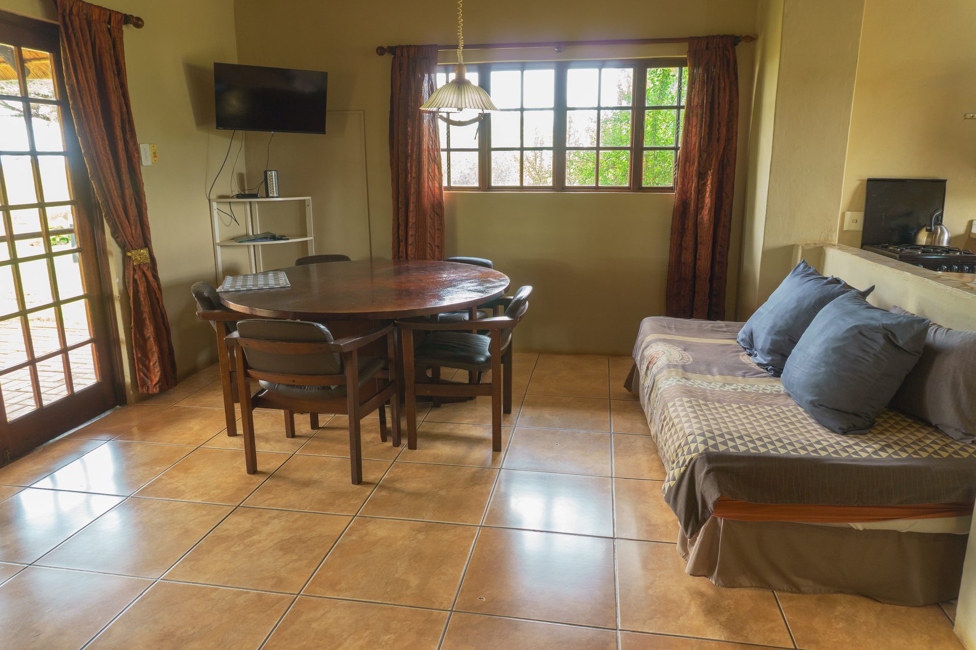 Dining area in 7-sleeper chalet at Gallery Inn Bela Bela Limpopo