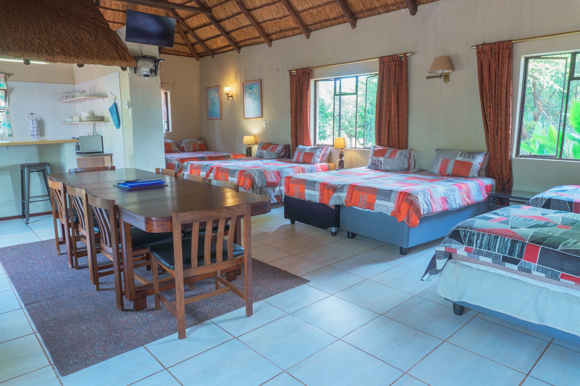 Dining area in 8-sleeper group chalet at Gallery Inn Bela Bela