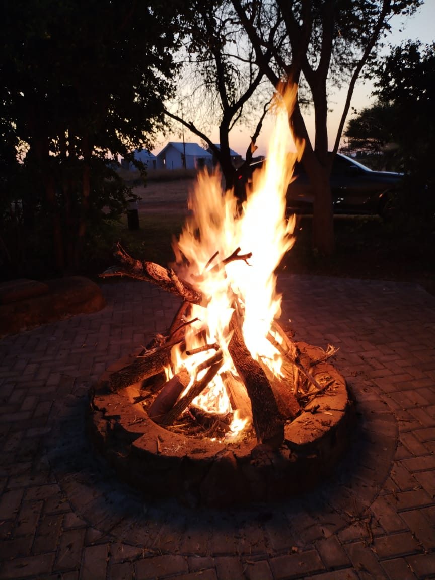 Boma fire at dusk at Gallery Inn Bela Bela